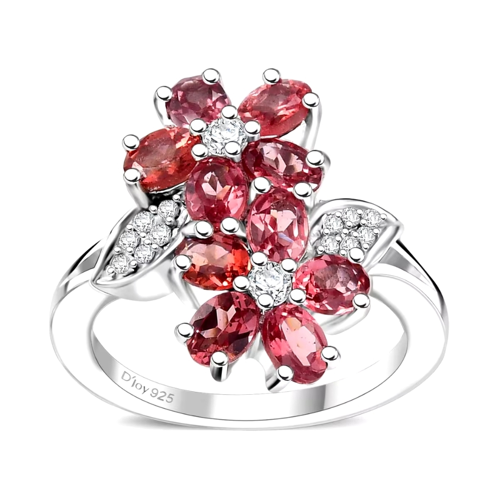 Tanzanitian Blush Garnet In A Bypass Ring With white Zircon